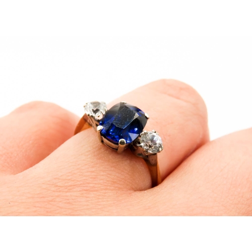 118 - Sapphire and Gemstone Set Three Stone Ring Mounted in 9 Carat Yellow Gold Ring Size N and a Half