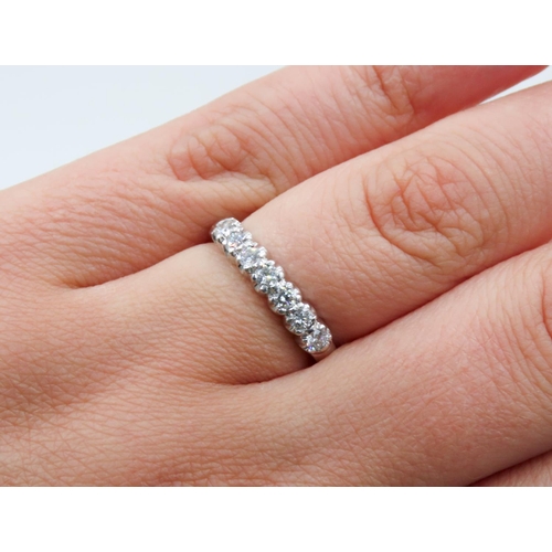 133 - Diamond Seven Stone Belcher Set Ring Mounted in 18 Carat White Gold Ring Size M and a Half