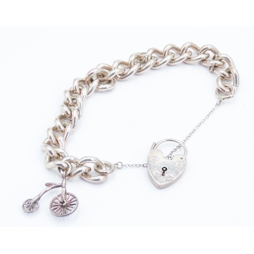 141 - Silver Curb Link Bracelet with Bicycle Charm and Heart Form Clasp 18cm Long