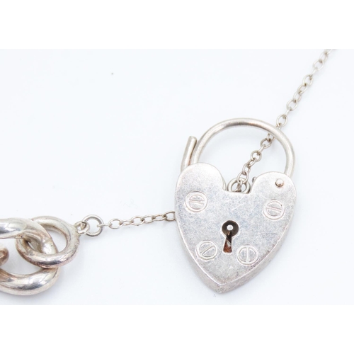 141 - Silver Curb Link Bracelet with Bicycle Charm and Heart Form Clasp 18cm Long