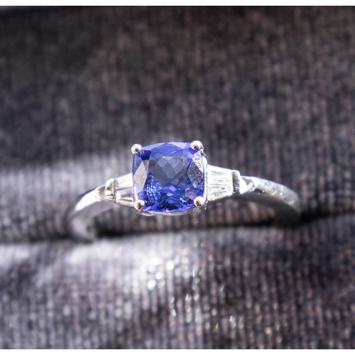 151 - Cushion Cut Tanzanite Set Ring with Further Tapered Baguette Cut Diamonds to Shoulders Mounted in Pl... 