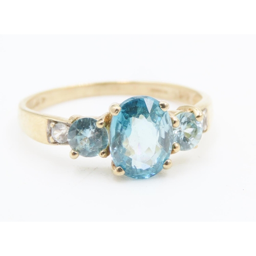 167 - Blue Topaz and Aquamarine Three Stone Ring Mounted in 10 Carat Yellow Gold Ring Size P and a Half