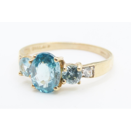 167 - Blue Topaz and Aquamarine Three Stone Ring Mounted in 10 Carat Yellow Gold Ring Size P and a Half