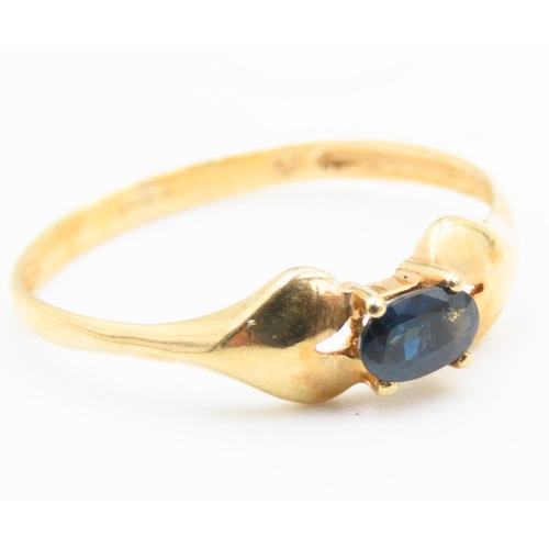 177 - Oval Cut Sapphire Solitaire Ring Mounted in 9 Carat Yellow Gold Ring Size Q