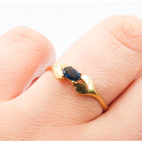 177 - Oval Cut Sapphire Solitaire Ring Mounted in 9 Carat Yellow Gold Ring Size Q