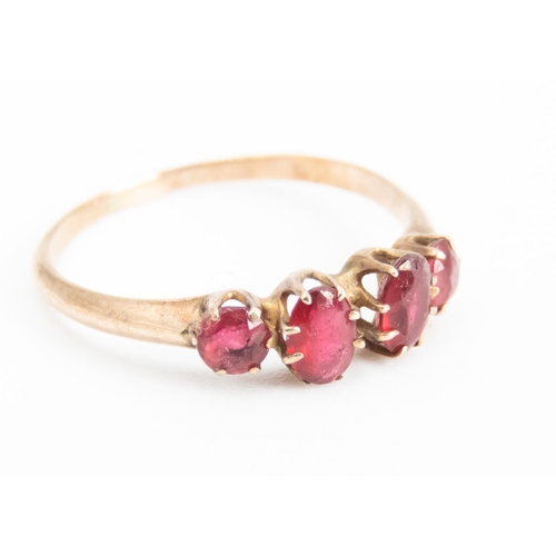 18 - Ruby Four Stone Set Ring Mounted in 9 Carat Rose Gold Ring Size O