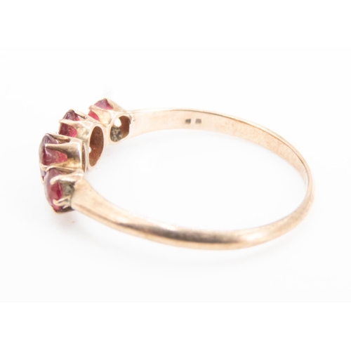 18 - Ruby Four Stone Set Ring Mounted in 9 Carat Rose Gold Ring Size O