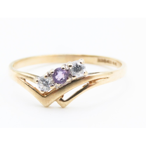 181 - Amethyst and Gemstone Set Ladies Three Stone Ring Mounted in 9 Carat Yellow Gold Ring Size O