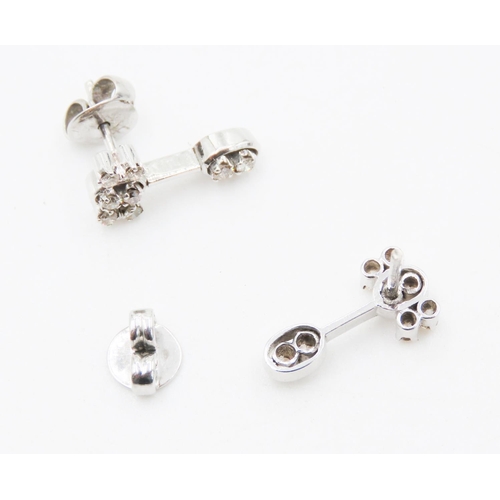 185 - Pair of 18 Carat White Gold Diamond Set Earrings Attractively Detailed Each Approximately 1.8cm High