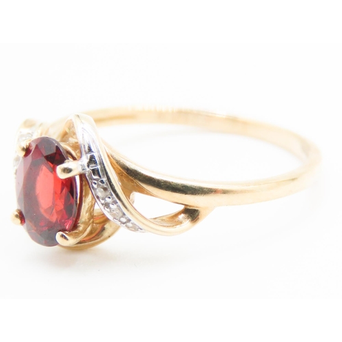 187 - Red Garnet Centre Stone Ring Swirl Form Mounted in 9 Carat Yellow Gold Ring Size M