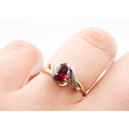 187 - Red Garnet Centre Stone Ring Swirl Form Mounted in 9 Carat Yellow Gold Ring Size M