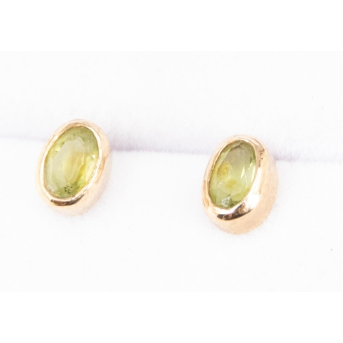 19 - Pair of Bezel Set Peridot Earrings Set in 9 Carat Yellow Gold 6mm High