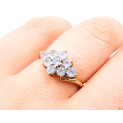 192 - Nine Stone Pale Tanzanite Cluster Ring Mounted in 9 Carat Yellow Gold Ring Size M