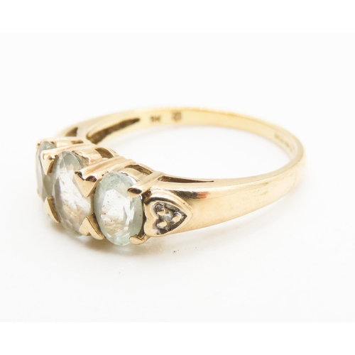 195 - Three Stone Aquamarine Ring Love Heart Motifs Further Diamond Insets to Shoulders Mounted in 9 Carat... 