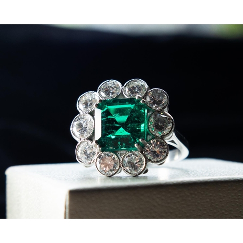 204 - Cushion Cut Emerald Centre Stone Ring Four Double Prong Set with Ten Stone Diamond Surround Set in P... 