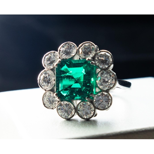 204 - Cushion Cut Emerald Centre Stone Ring Four Double Prong Set with Ten Stone Diamond Surround Set in P... 