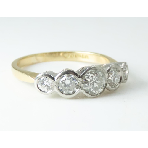 210 - Diamond Five Stone Graduated Form Bezel Set Ring Mounted on 18 Carat Yellow Gold Ring Size O