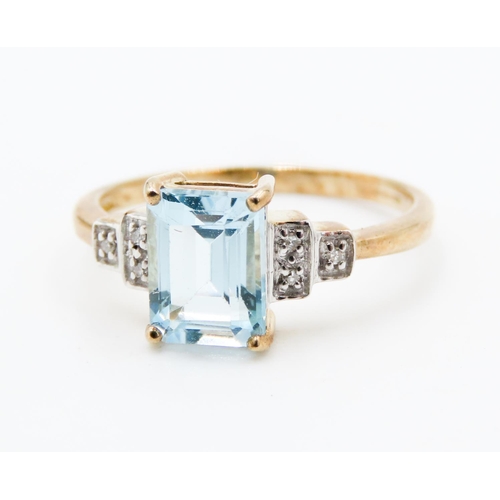 218 - Emerald Cut Aquamarine Set Ring Mounted in 9 Carat Yellow Gold Further Diamonds Set to Shoulders Rin... 