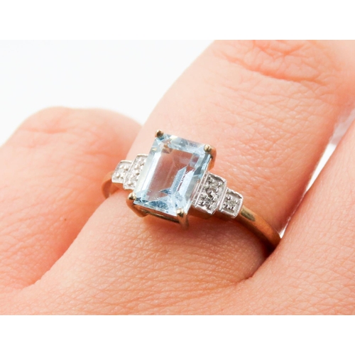 218 - Emerald Cut Aquamarine Set Ring Mounted in 9 Carat Yellow Gold Further Diamonds Set to Shoulders Rin... 