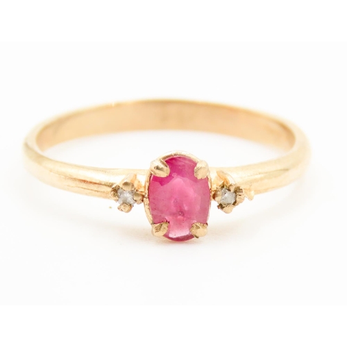 239 - Oval Cut Ruby Centre Stone Ring Mounted in 9 Carat Yellow Gold Further Diamonds Set to Shoulders Rin... 