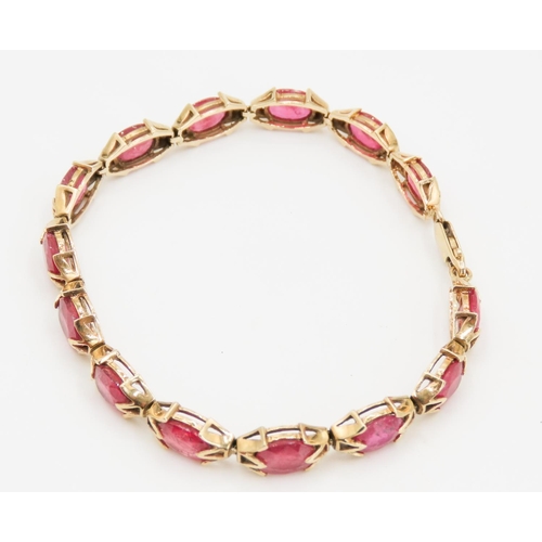 246 - Fourteen Stone Ruby Set Ladies Bracelet Attractively Detailed Mounted in 9 Carat Yellow Gold 19.5cm ... 