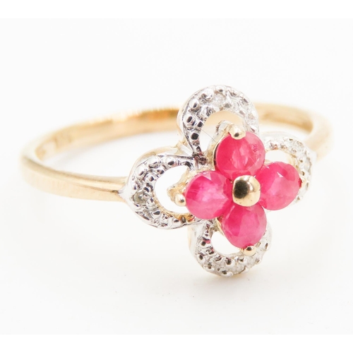 249 - Ruby Daisy Motif Ring Mounted in 9 Carat Yellow Gold with Further Diamond Surround Ring Size L