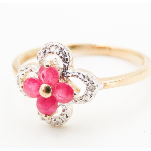 249 - Ruby Daisy Motif Ring Mounted in 9 Carat Yellow Gold with Further Diamond Surround Ring Size L