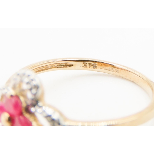 249 - Ruby Daisy Motif Ring Mounted in 9 Carat Yellow Gold with Further Diamond Surround Ring Size L