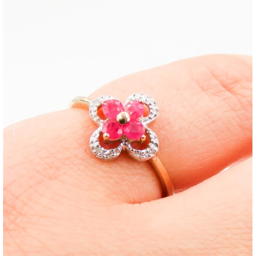 249 - Ruby Daisy Motif Ring Mounted in 9 Carat Yellow Gold with Further Diamond Surround Ring Size L