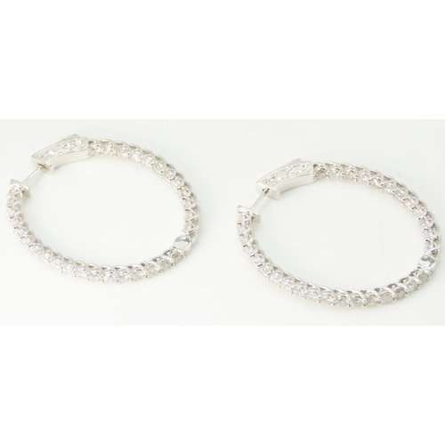 254 - Pair of Diamond Eternity Trellis Set Ladies Oval Hoop Earrings Mounted in 18 Carat White Gold Total ... 