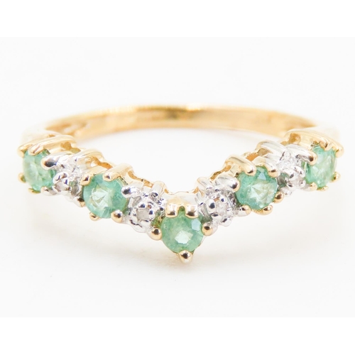 256 - Emerald and Diamond Set Ladies Wishbone Ring Mounted in 9 Carat Yellow Gold Ring Size L