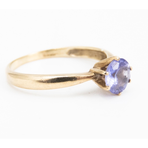 26 - Tanzanite Solitaire Ring Six Claw Set Mounted in  9 Carat Yellow Gold Ring Size L