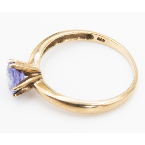 26 - Tanzanite Solitaire Ring Six Claw Set Mounted in  9 Carat Yellow Gold Ring Size L