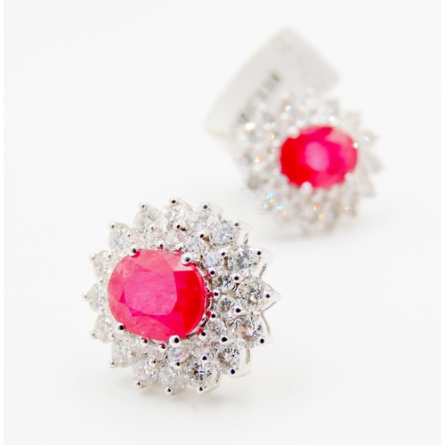 267 - Pair of Ruby Set Earrings with Double Diamond Halo Set in 18 Carat Rose Gold Each 1.5cm High Rubies ... 