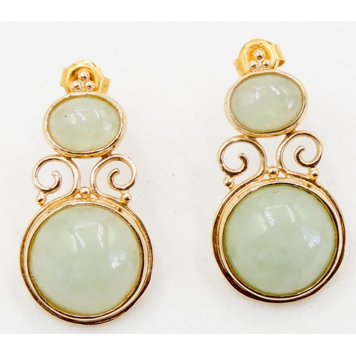 268 - Pair of Attractively Detailed Bezel Set Jade Drop Earrings Mounted in 9 Carat Yellow Gold 3cm High