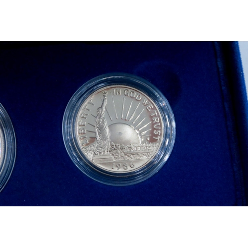 284 - United States Liberty Coins 1986 Liberty Half Dollar and 1986 Liberty Fine Silver Dollar Encapsulate... 