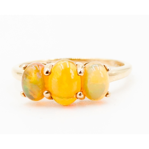 288 - Opal Three Stone Ring Basket Set Mounted in 9 Carat Yellow Gold Ring Size O