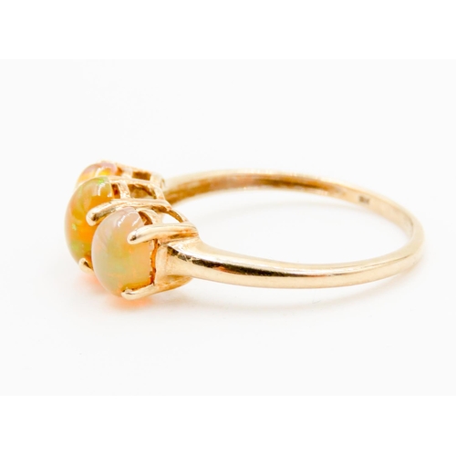 288 - Opal Three Stone Ring Basket Set Mounted in 9 Carat Yellow Gold Ring Size O