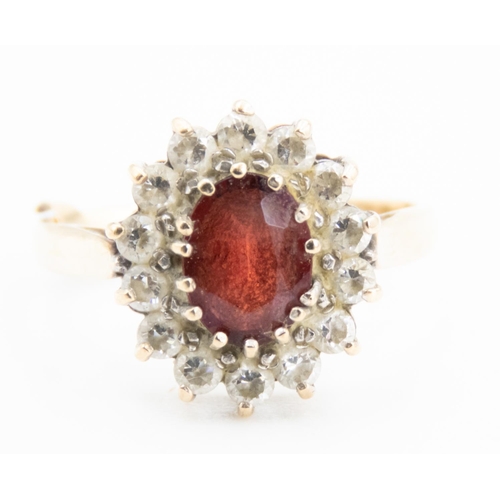 29 - Red Garnet and Gemstone Set Cluster Ring Mounted in 9 Carat Yellow Gold Ring Size P