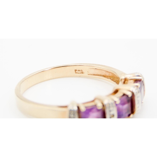 291 - Three Stone Amethyst and Diamond Set Ladies Ring Mounted in 9 Carat Yellow Gold Ring Size P