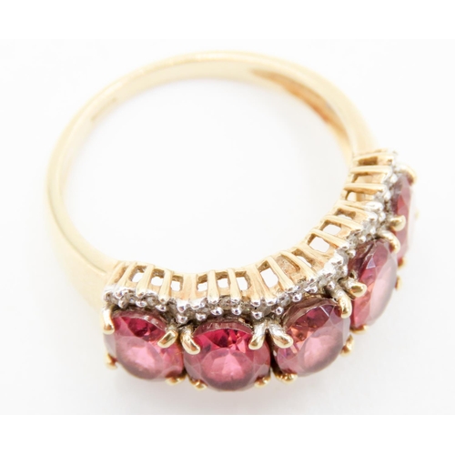 298 - Five Stone Oval Cut Pink Spinel Ring Mounted in 9 Carat Yellow Gold Further Diamond Set Surround Rin... 