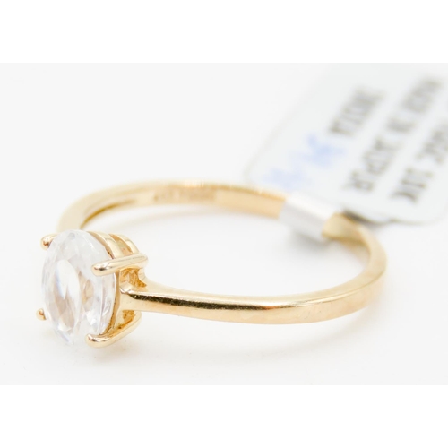 305 - Oval Cut Zircon Solitaire Ring Four Claw Set Mounted in 10 Carat Yellow Gold Ring Size N and a Half