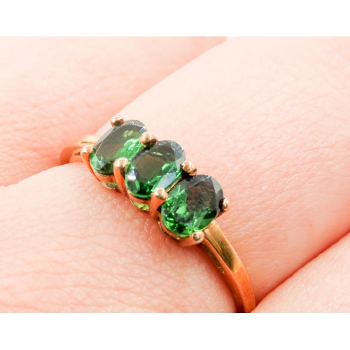 306 - Three Stone Diopside Set Ring Mounted in 9 Carat Yellow Gold Ring Size S