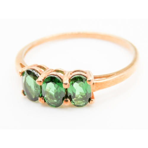 306 - Three Stone Diopside Set Ring Mounted in 9 Carat Yellow Gold Ring Size S