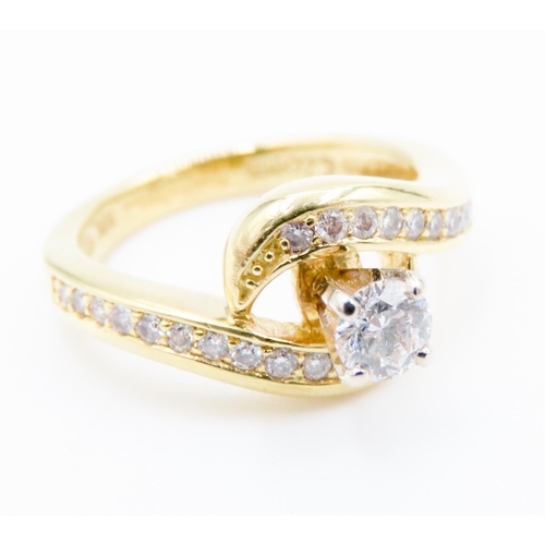 308 - Four Claw Set Diamond Swirl Motif Solitaire Ring further Diamonds Set to Band Mounted in 18 Carat Ye... 