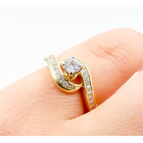 308 - Four Claw Set Diamond Swirl Motif Solitaire Ring further Diamonds Set to Band Mounted in 18 Carat Ye... 