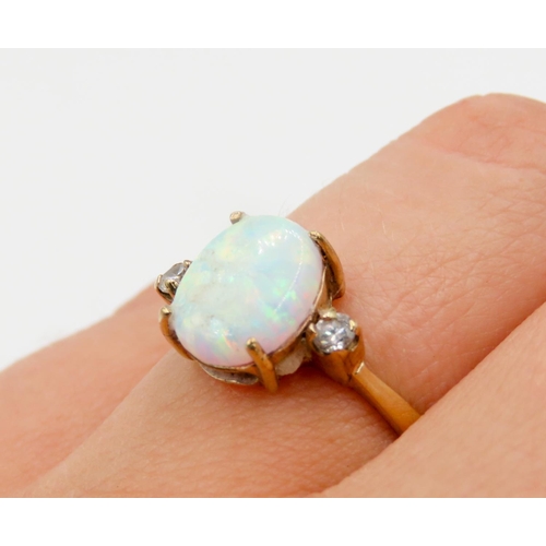 310 - Four Claw Set Opal Ring Mounted in 9 Carat Yellow Gold further Gemstone Set to Shoulders Ring Size Q