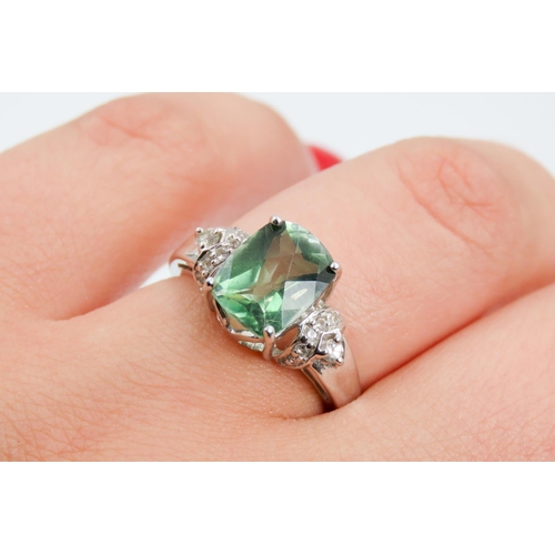 327 - Facet Cut Green Amethyst Centre Stone Ring Further Diamonds Set to Shoulders Mounted in 9 Carat Whit... 