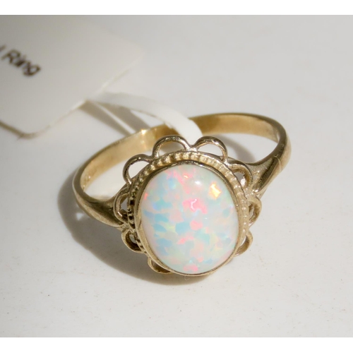 329 - Opal Single Stone Ring Finely Detailed Hollow Petal Surround Mounted in 9 Carat Yellow Gold Ring Siz... 