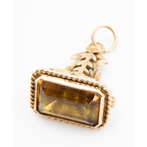 33 - Citrine Set Fob Pendant Mounted in 9 Carat Yellow Gold Attractively Detailed Floral Motifs 3cm High